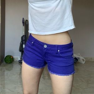 Purple shorts.